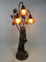 Large art nouveau style figural lamp with amber glass shades, approx 33" tall.