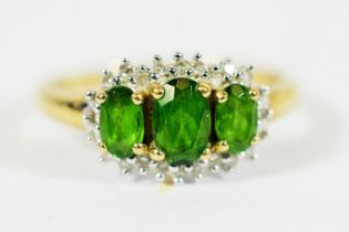 9ct Yellow Gold Ring set with Three Central Emeralds with Diamond Surround.. Finger size 'Q-5 to R