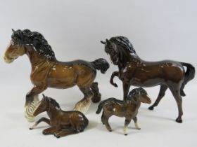 2 Beswick bay horse figurines and 2 bay foals.