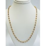 9ct Yellow Gold 20 inch Neck Chain interspersed with small globes between links.  Total weight appro