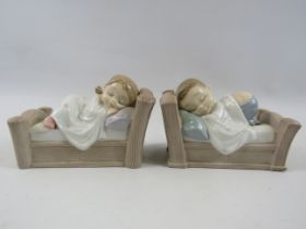 2 Nao figurines Snuggle dreams and cozy dreams.