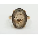 9ct Yellow Gold ring set with a large Oval Smokey Quartz which measures 15 x 10 mm.  Finger size 'L-