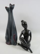 2 Abstract style figures one of a lady seated and one of a pair of cats. The cats measure 13".