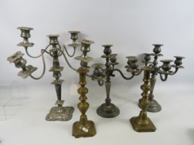 Selection of candelabras and candle sticks, the tallest measures 17.5".