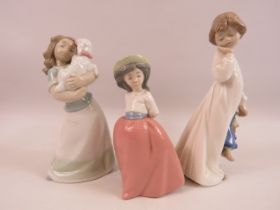 3 Nao figurines of little girls, the tallests measures 8".