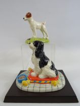 2 Royal Doulton dog Figurines of a King Charles Cavarlier and a Jack Russel. Both come with boxes.