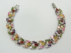 925 Silver Bracelet Set with multi coloured gemstones. 7 inches long in unused as new condition. Se