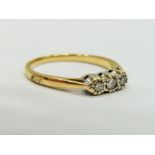 18ct Yellow Gold Diamond Trilogy Ring with White and Yellow Gold setting. Central Diamond 0.10pts, a