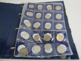 Folder containing various collectable two pound coins, one pound coins and fifty pences (overall