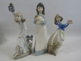 3 Nao Girl figurines with animals, the tallest measures approx 9".