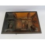 Vintage Swiss hand carved musical diorama in working condition, 13" by 9".