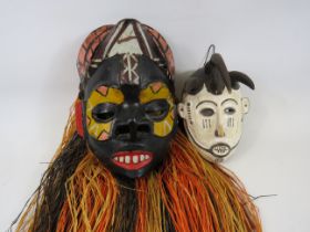 Pair of tribal masks.