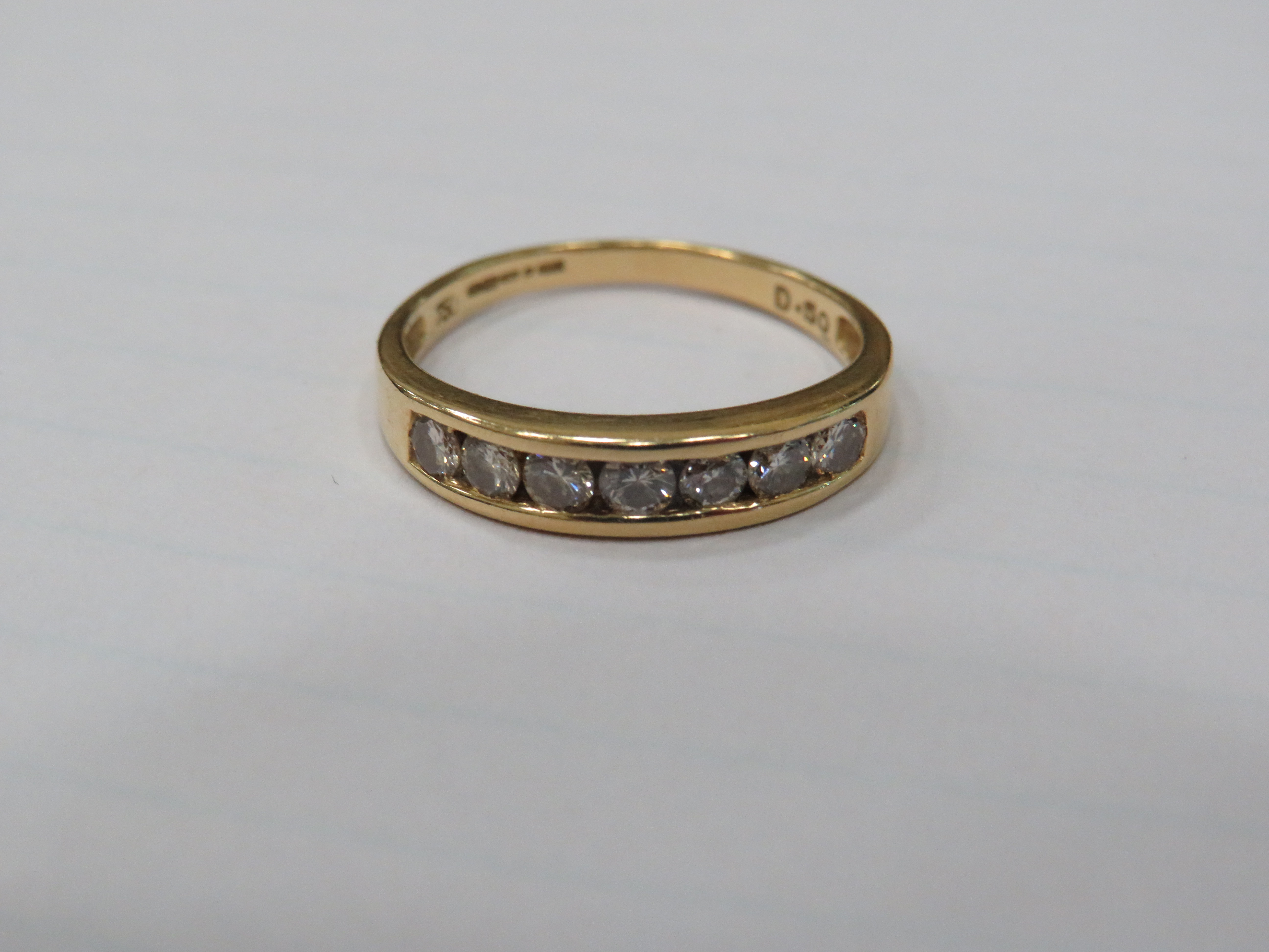 18ct Yellow Gold Ring set with Seven Diamonds of approx 0.07pts each. Finger size 'P' 2.9g