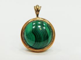 Banded Malachite pendant set in a 9ct Yellow Gold Mount. Pendant measures approx 25mm long. See phot