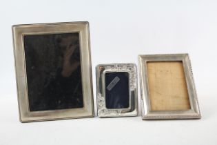 Three Hallmarked Silver photo frames 493895