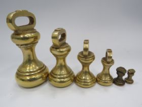 Set of brass bell weights.