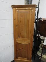 Large Solid pine corner cabinet with top and bottom doors reavealing fixed pine shelves. H:78 x W: