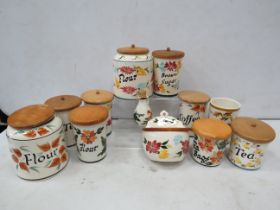 Large selection of Toni Raymond pottery storage jars.