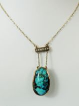 Antique, Banded Turquoise pendant set on a 9ct Mount and hung on a 9ct Yellow gold chain of approx 1