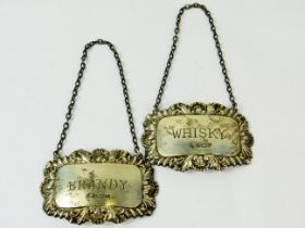 Matched pair of Hallmarked Silver Decanter Collars with chains. Combined weight 26.8g See photos.