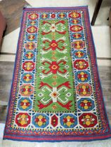 Good Quality Turkish Made fringed rug which measures approx 62 x 34 inches. In good condition. See