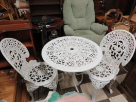 Lightweight metal garden table with two chairs, all in the antique style. See photos. S2