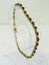 9ct Gold 8 inch Bracelet set with 30 Deep Blue Sapphires. Lobster claw catch. Total weight 7.1g