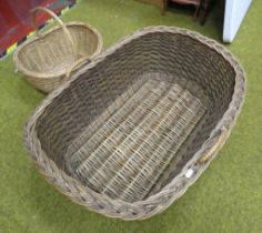 Large vintage wicker moses basket plus a small wicker carry basket.