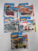 5 Hotwheels cars in packets.