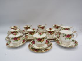 8 Royal Albert Old Country Roses trios and 3 cups and saucers, 30 pieces in total.