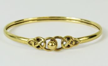 9ct Yellow Gold Torque bracelet with Celtic knot clasp decoration. Total Weight 7.6g