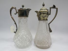 2 Vintage crystal glass claret jugs with silver plated tops.