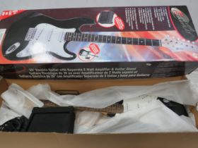 Power play 39" electric guitar with amp and stand in original box, very light if any use.