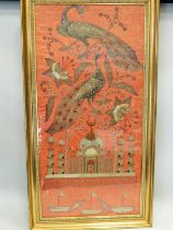 Beautifully embroidered picture of Peacocks & Temple, probably Indian made. Framed under glass in