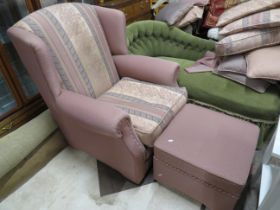 Good Quality upholstered armchair in excellent condition. Comes complete with lidded footstool. S