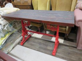 Victorian era garden table made by Lunn & Reynolds of Bradford with cast metal ends and a recently r