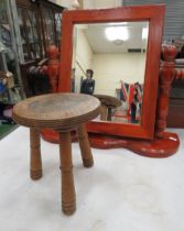 Dressing table mirror and a small vintage milking stool.