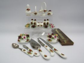 Selection of Royal Albert Old Country roses including place settings, napkin rings, cutlery etc.