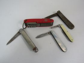 4 Vintage pen knives and a swiss army knife.