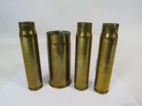 4 small brass shell cases, 1885 and 1940s.