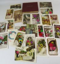 Colourful vintage postcards and a 1930s Autograph book with quotes and well wishes written inside.