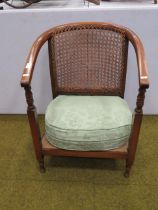 1920's era very low Tub style chair with bergere back, non original seat squab. Seat height 13 inche