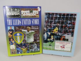 Official History of Scunthorpe United Football Club containing lots of autographed pages together wi