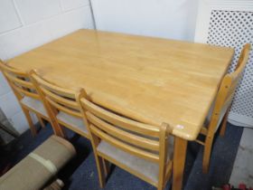 Blondewood Kitchen table with Six matching chairs, each has fire tickets . Table measures H:30 x W: