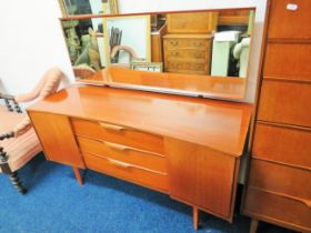 Mid 20th Century stylish Teak Bedroom dressing table with three central drawers and two side cupboar
