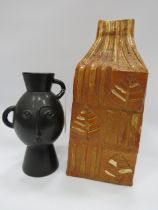 Large rustic art pottery vase and a modenist Sass and Belle face vase.