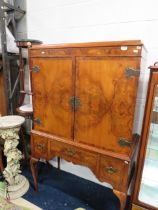 Elegant Reproduction of a Victorian era Cabinet with opening doors which reaveal six smaller shelves