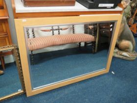 Large bevelled glass teak framed modern mirror which measures approx 30 x 41 inches. See photos.