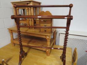 Attractive vintage towel stand with barley twist decoration. Part of one foot scroll missing. See