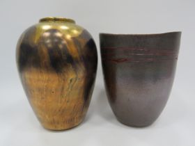 Waldross pottery lustre vase and a art glass vase. The tallest measures 9.5".